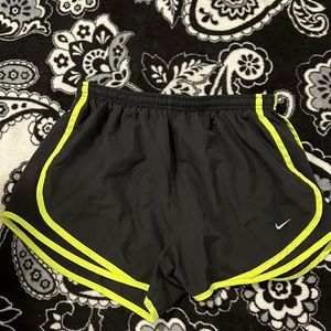 Black and neon yellow Nike shorts